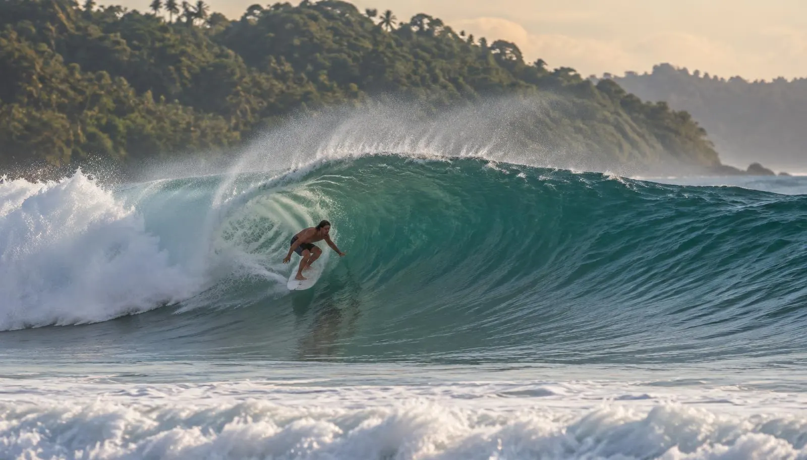 Surfer on an overhead wave at Santa Teresa, Nicoya Peninsula